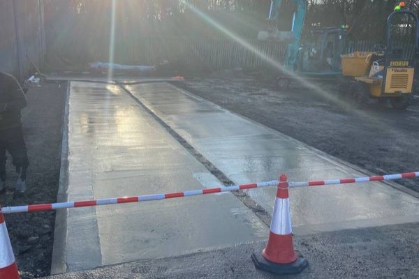 Concrete slab installation and footings in Manchester for structural foundations
